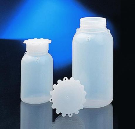 Liquid bottle with wide neck, screw cap and inner plug