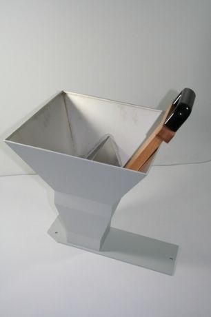 Wide-necked dosing funnel with a wooden pusher